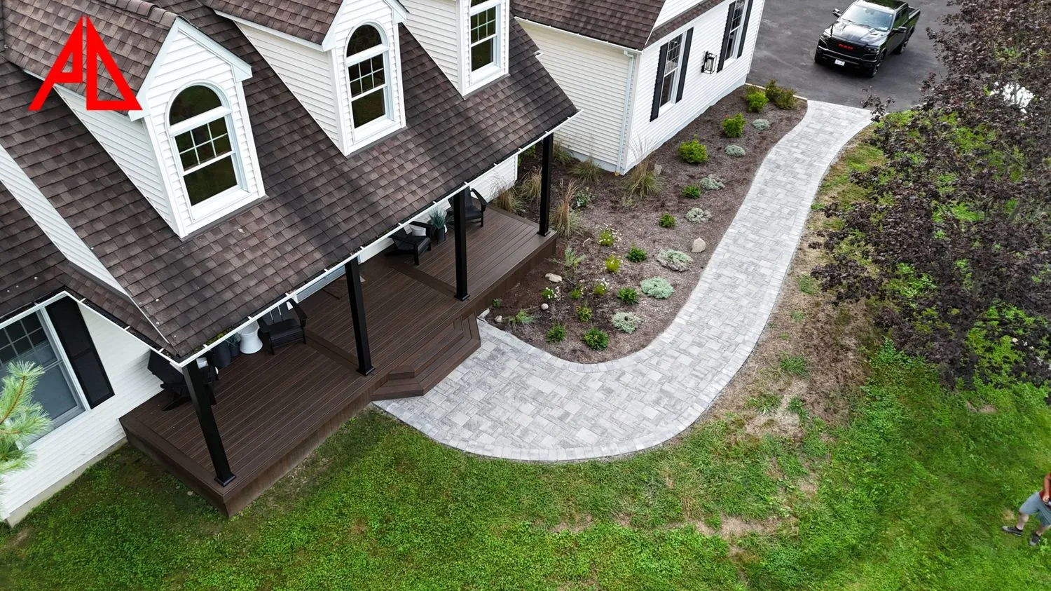 Covered porch and paver patio on a Dutchess County home