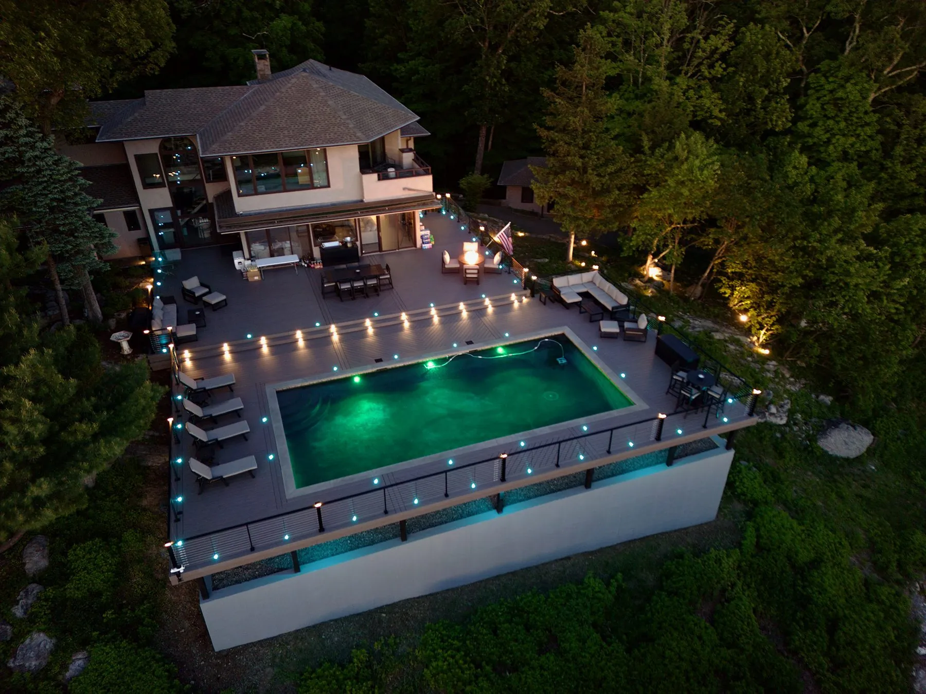 Hudson Horizon Haven — luxury multi-level Trex deck estate with pool and LED lighting, Garrison NY — Pinnacle Decking Hudson Valley NY